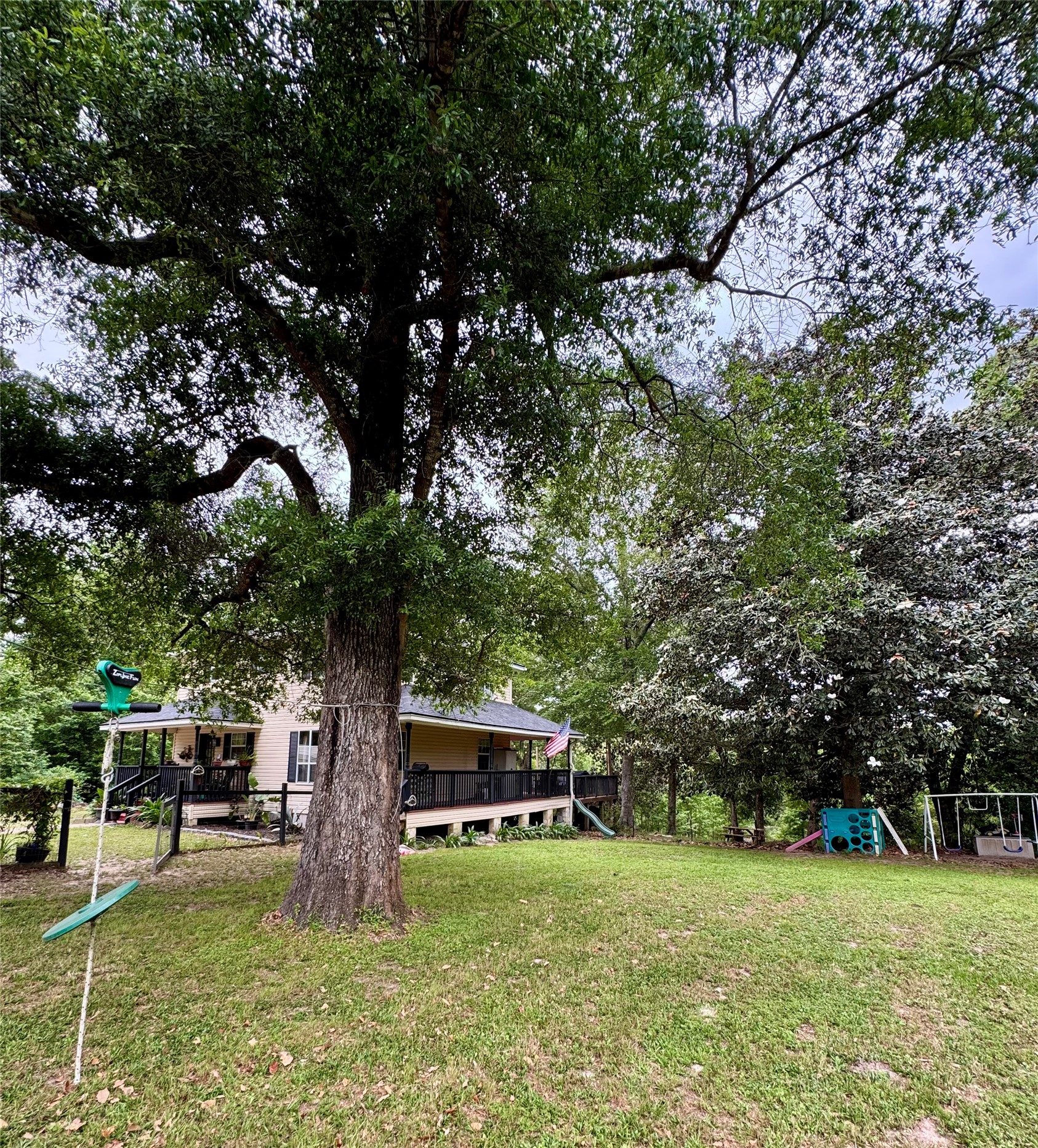 954 Hillbilly Heaven Road Livingston, TX 77351 - Photo 37 of 38 Side Yard - Fenced with gate. Access to porch- porch has gate at the steps.