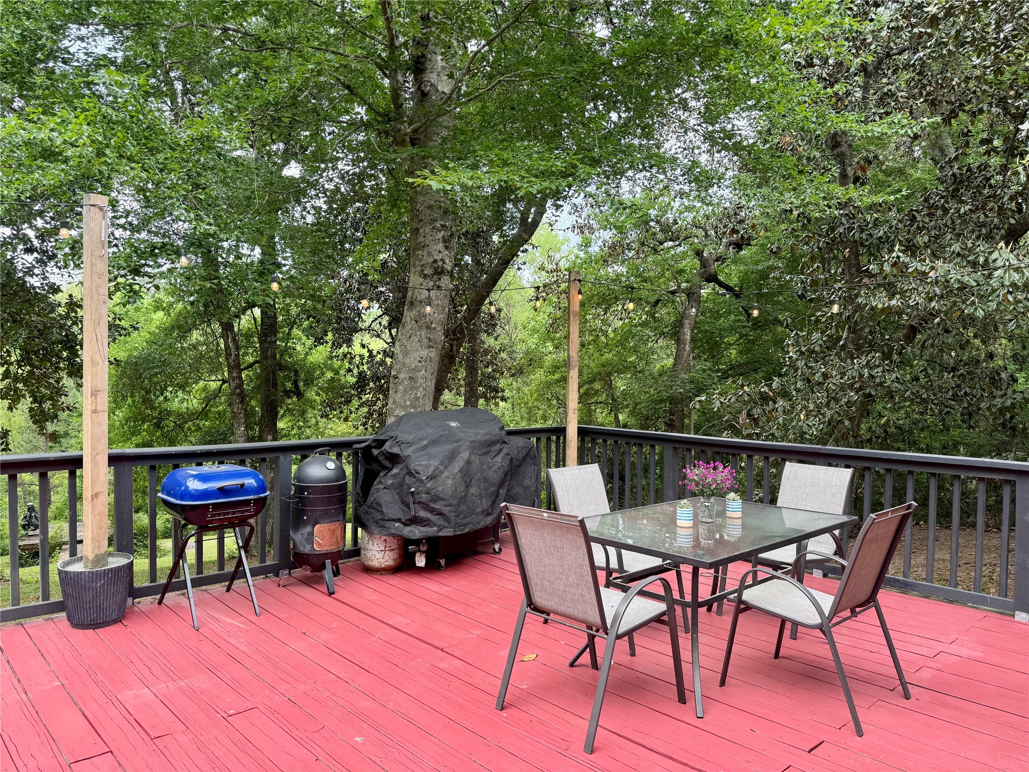 954 Hillbilly Heaven Road Livingston, TX 77351 - Photo 8 of 38 Multiple spots for entertaining and grilling.