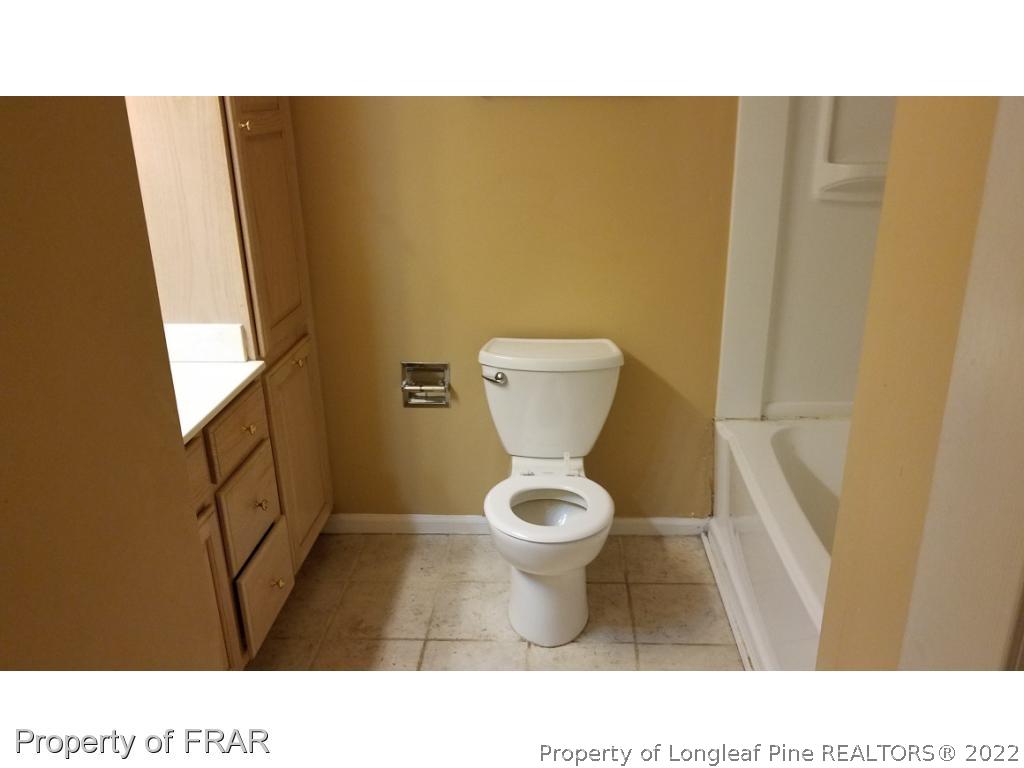 1817 Joel Road Carthage, NC 28327 - Photo 13 of 20 a bathroom with a toilet and a sink