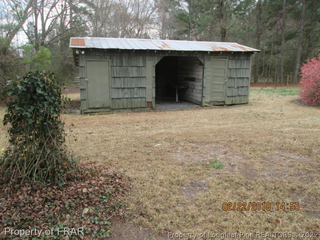 1817 Joel Road Carthage, NC 28327 - Photo 19 of 20 a front view of a house with a yard