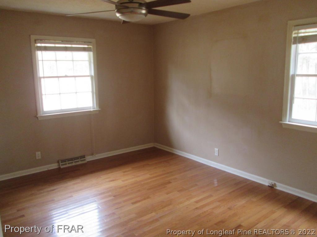 1817 Joel Road Carthage, NC 28327 - Photo 20 of 20 an empty room with a window
