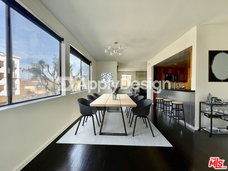 1505 Purdue Avenue, Unit 202 Los Angeles, CA 90025 - Photo 14 of 14 a view of a dining room with furniture window and wooden floor