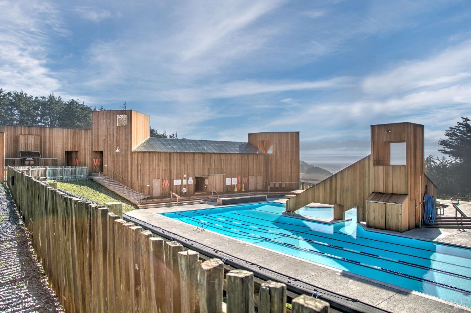 36964 Greencroft Close The Sea Ranch, CA 95497 - Photo 19 of 27 a view of a house with wooden fence