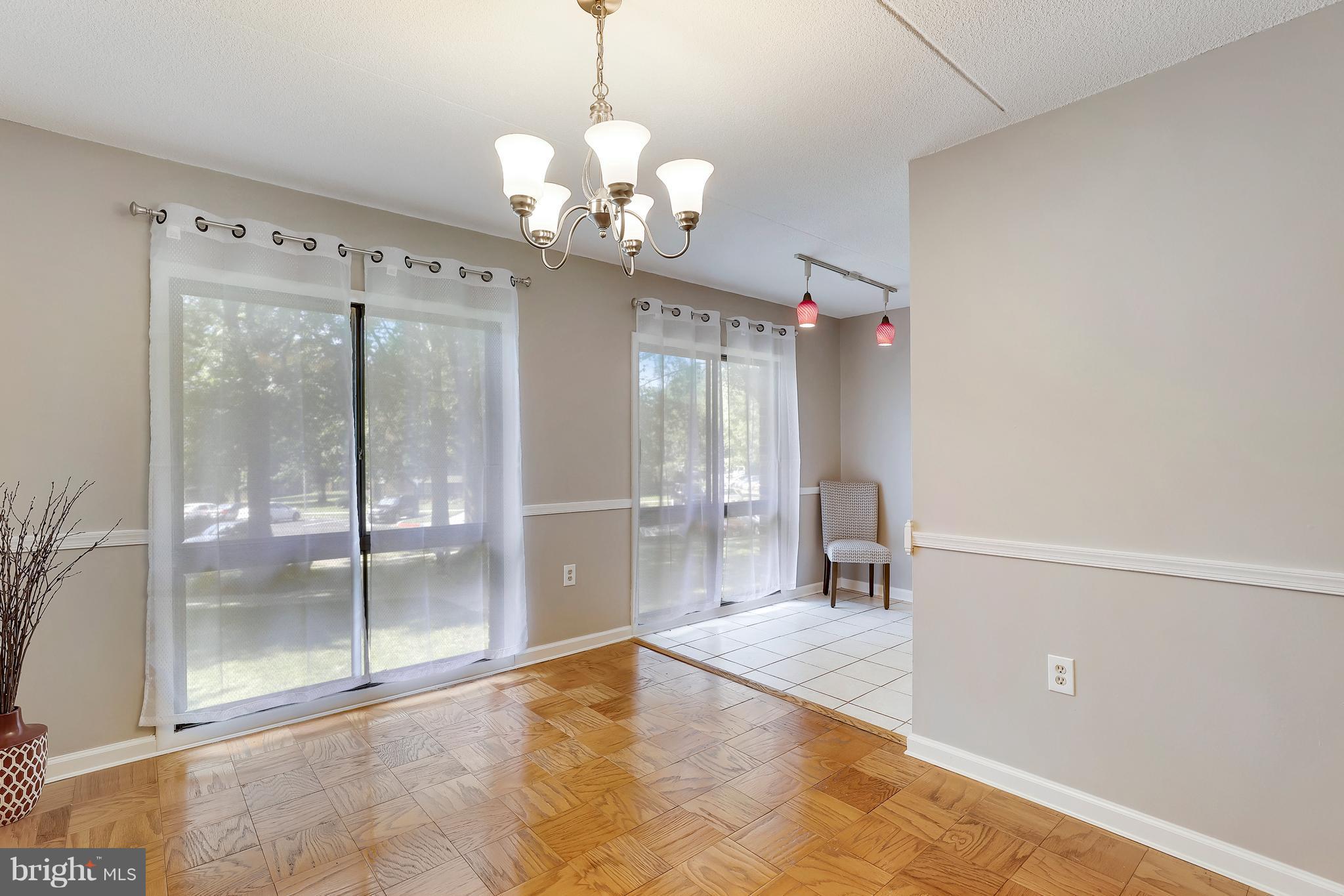 5237 West Running Brook Road, Unit 202 Columbia, MD 21044 - Photo 11 of 30 Kitchen leads into dining room