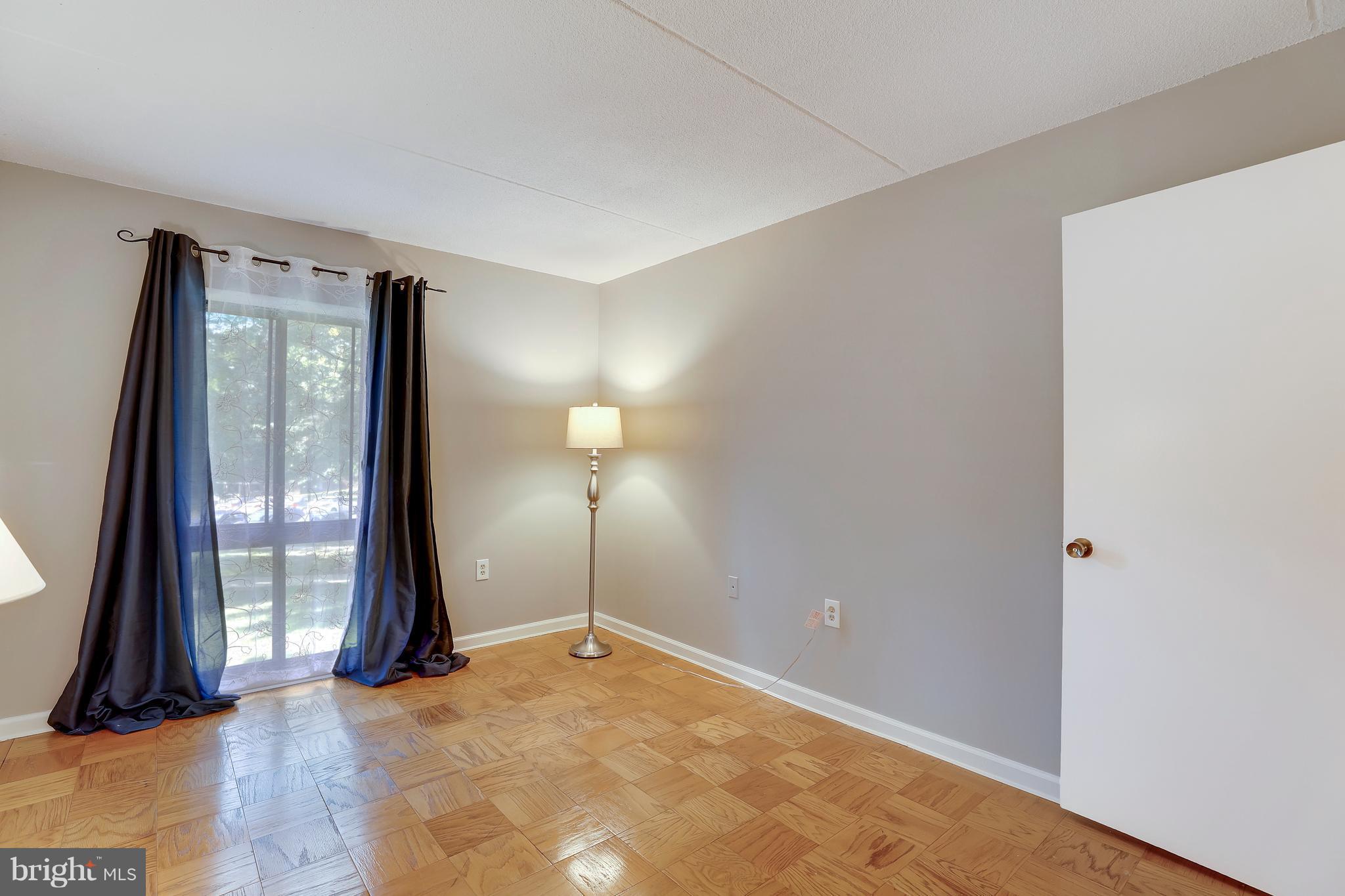 5237 West Running Brook Road, Unit 202 Columbia, MD 21044 - Photo 17 of 30 Bedroom with shining floors