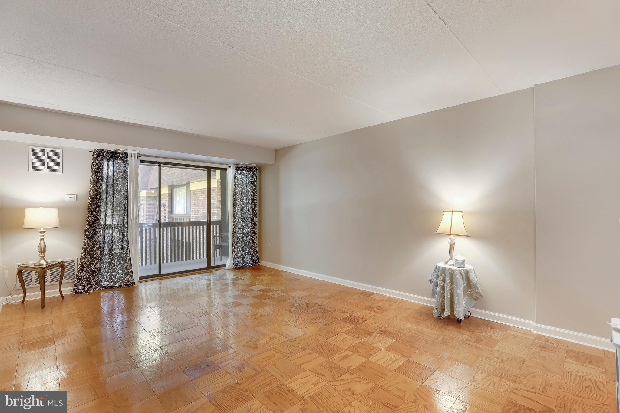 5237 West Running Brook Road, Unit 202 Columbia, MD 21044 - Photo 22 of 30 SPACIOUS Living Room w Balcony