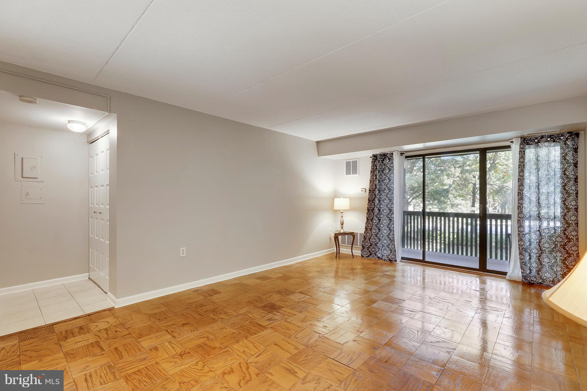 5237 West Running Brook Road, Unit 202 Columbia, MD 21044 - Photo 4 of 30 Beautiful Floors, sliders leading to balcony