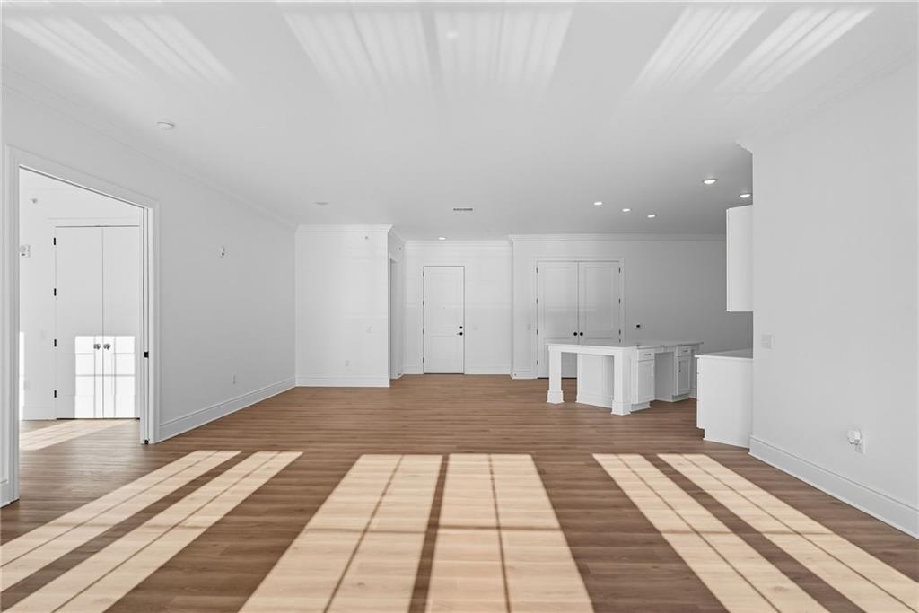 1 1st Street, Unit 407 Oakmont, PA 15139 - Photo 13 of 40 a view of a living room with kitchen