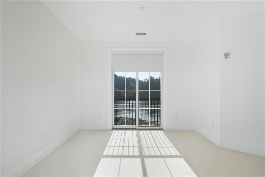 1 1st Street, Unit 407 Oakmont, PA 15139 - Photo 17 of 40 a view of empty room with windows