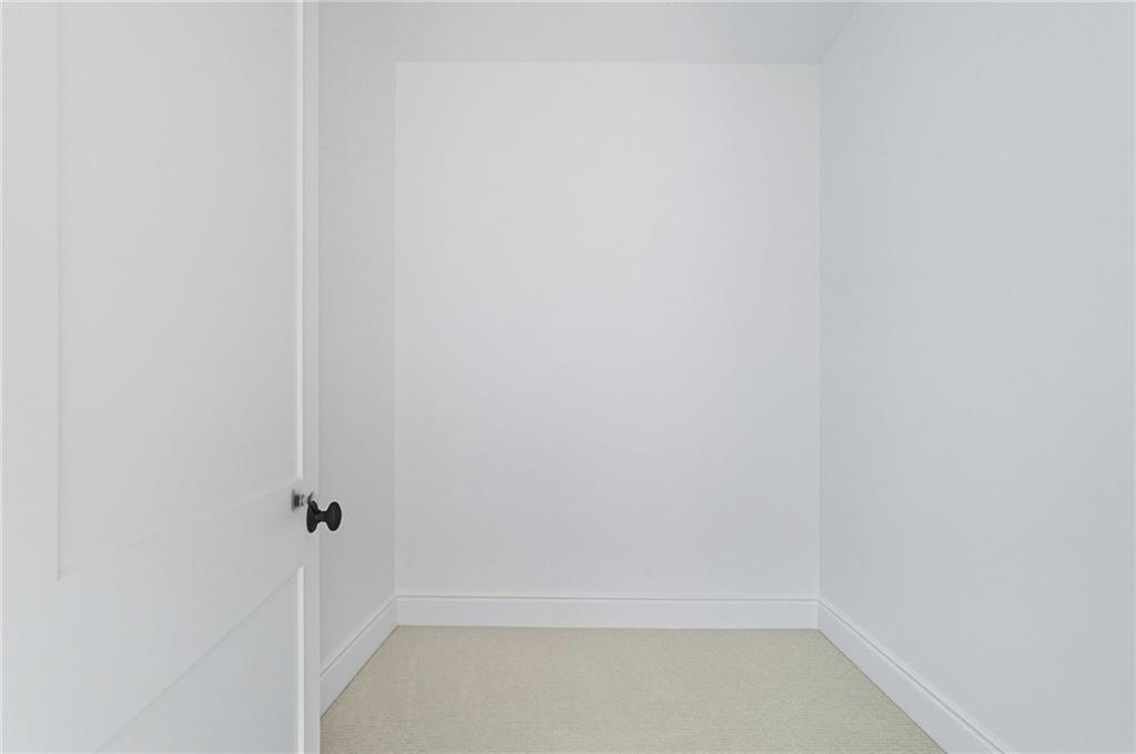 1 1st Street, Unit 407 Oakmont, PA 15139 - Photo 19 of 40 close up of a white marble wall