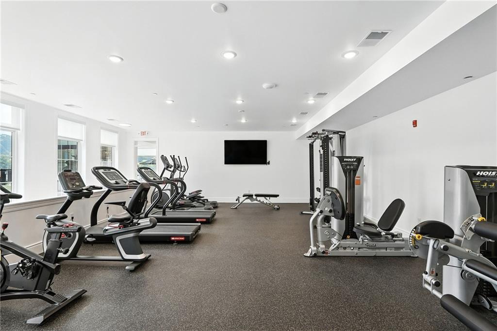 1 1st Street, Unit 407 Oakmont, PA 15139 - Photo 34 of 40 a view of a room with gym equipment