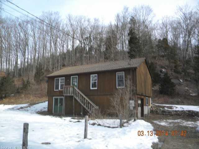 734 Kent Road New Milford, CT 06755 - Photo 1 of 1 a view of a house covered in snow