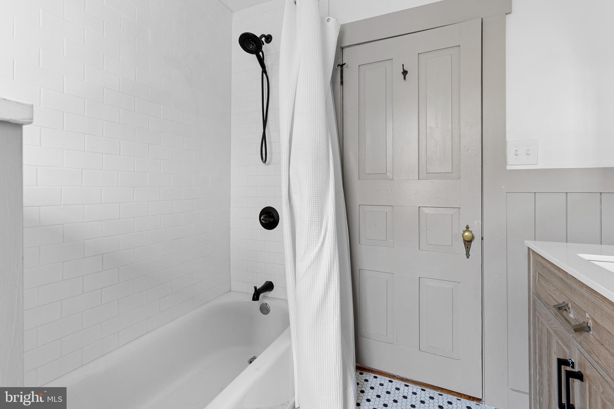 547 Concord Road Glen Mills, PA 19342 - Photo 11 of 42 a bathroom with a shower and a tub