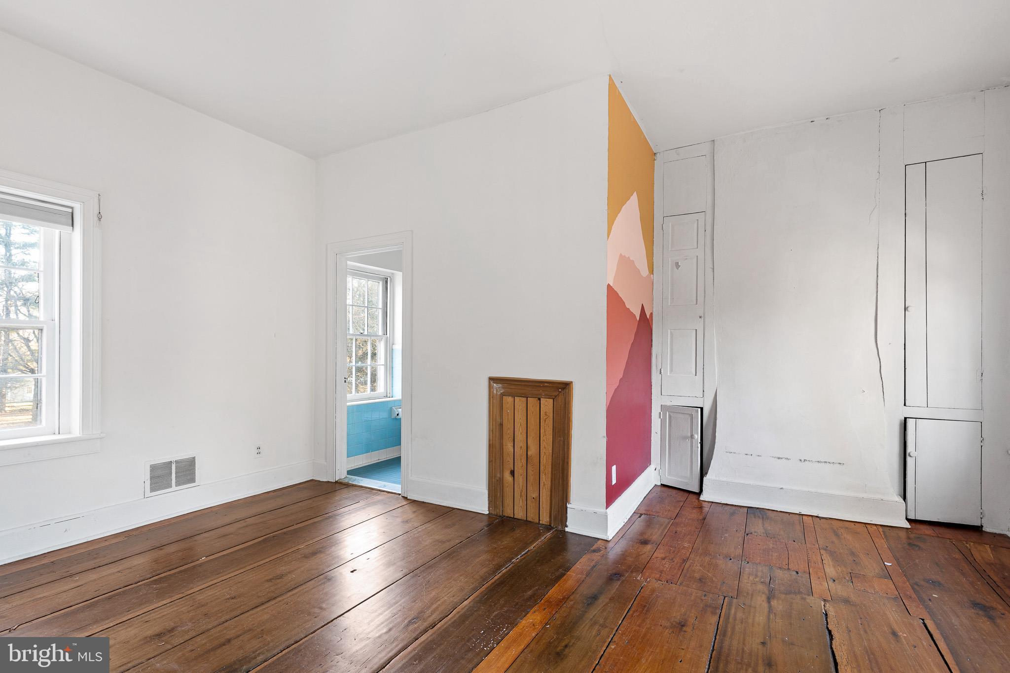 547 Concord Road Glen Mills, PA 19342 - Photo 20 of 42 wooden floor in an empty room with a window