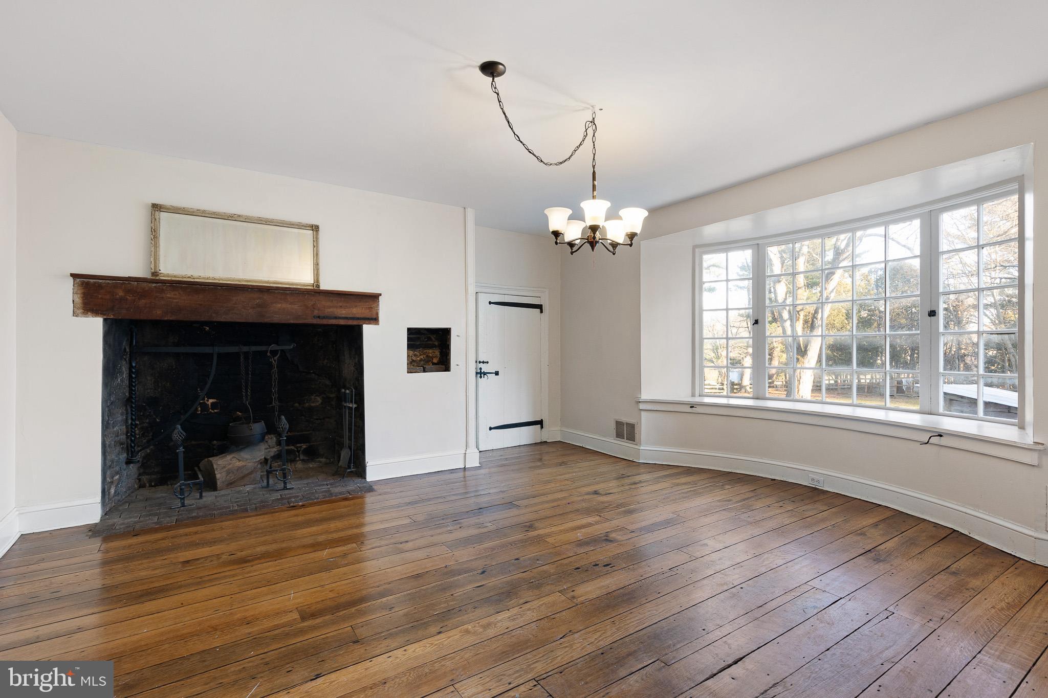 547 Concord Road Glen Mills, PA 19342 - Photo 34 of 42 a view of empty room with wooden floor and fan