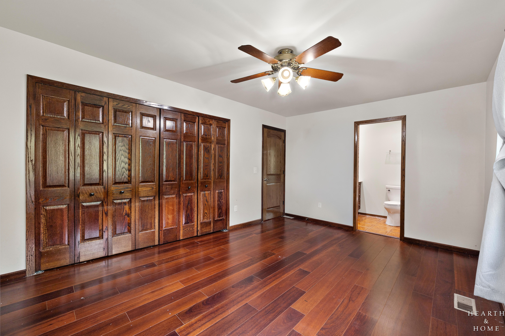 506 Old Hunt Road Fox River Grove, IL 60021 - Photo 20 of 44 a view of an empty room with wooden floor
