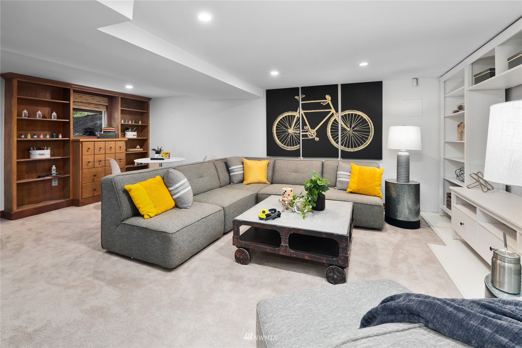 2419 2nd Avenue West Seattle, WA 98119 - Photo 17 of 30 a living room with furniture and kitchen view