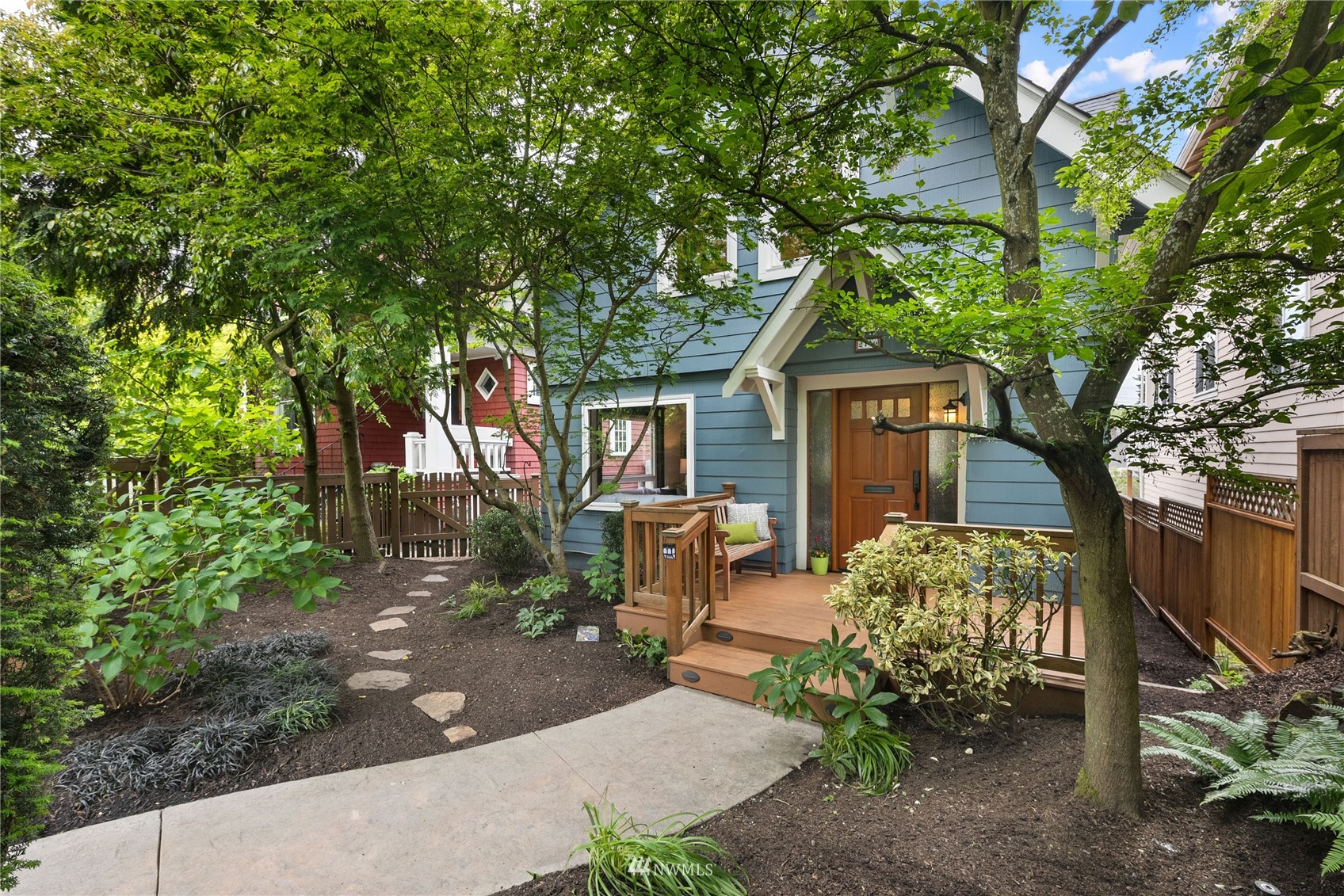 2419 2nd Avenue West Seattle, WA 98119 - Photo 2 of 30 a front view of a house with garden