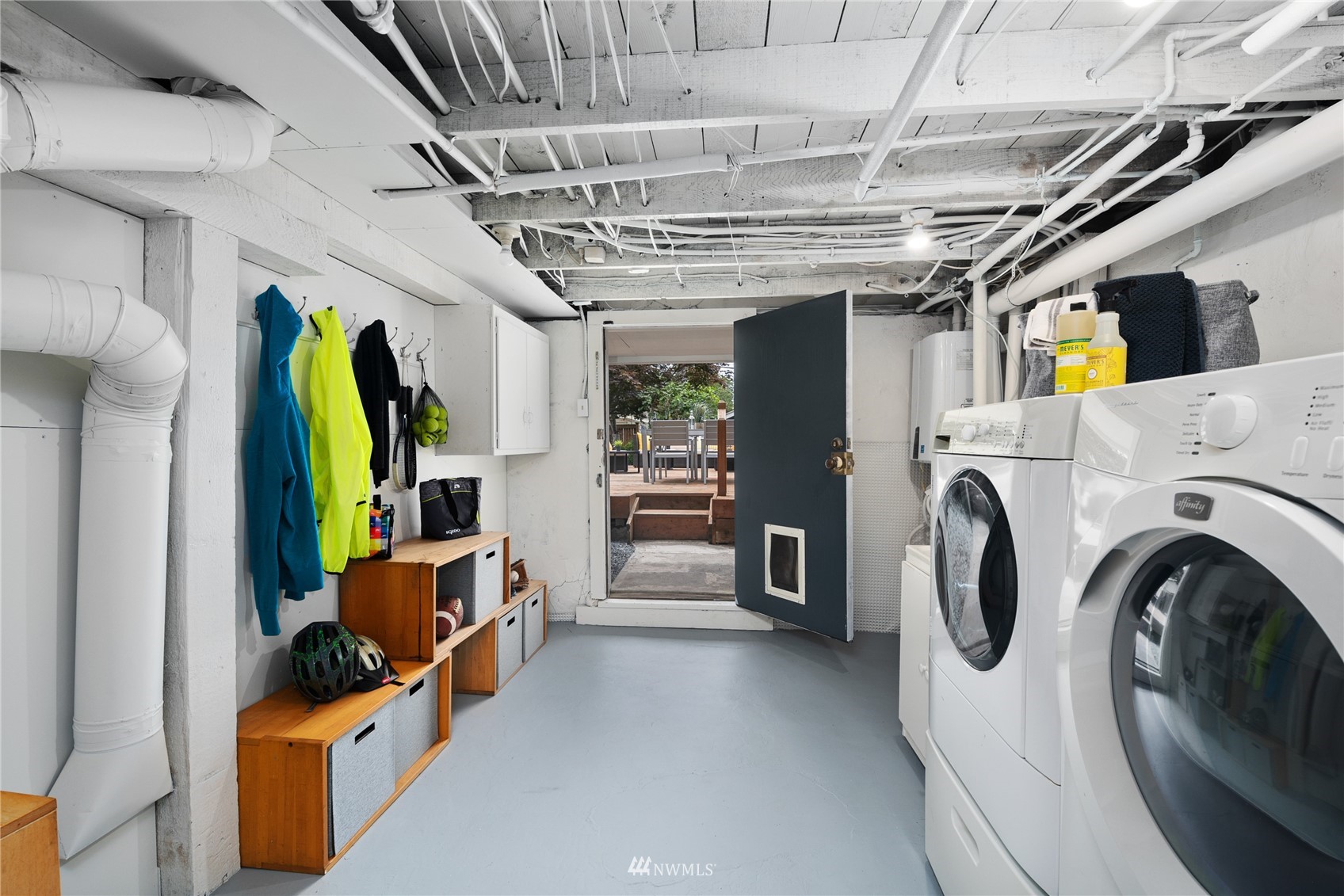 2419 2nd Avenue West Seattle, WA 98119 - Photo 21 of 30 a view of a hallway with washer and dryer