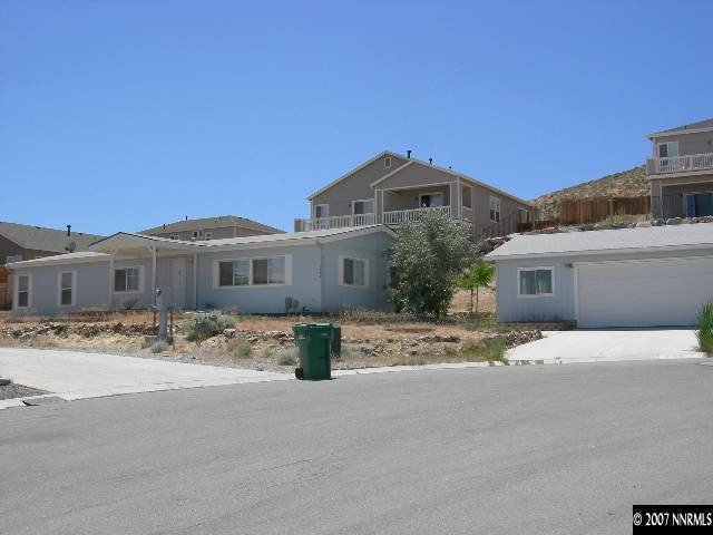 1476 Denali Court Reno, NV 89506 - Photo 1 of 5 a front view of a house with a yard
