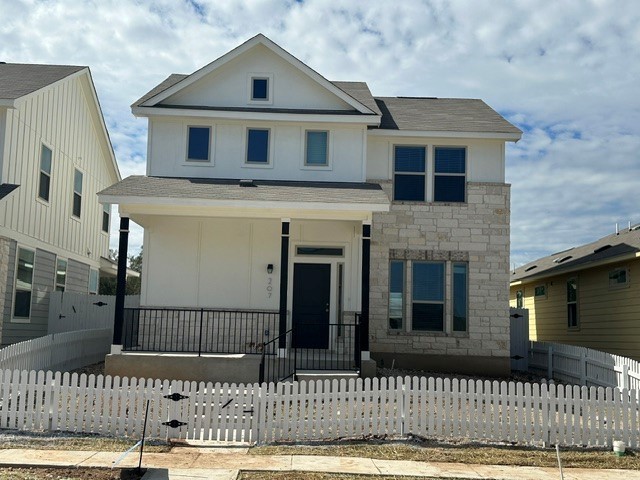 207 Rieber Road Kyle, TX 78640 - Photo 1 of 1 a front view of a house with a fence