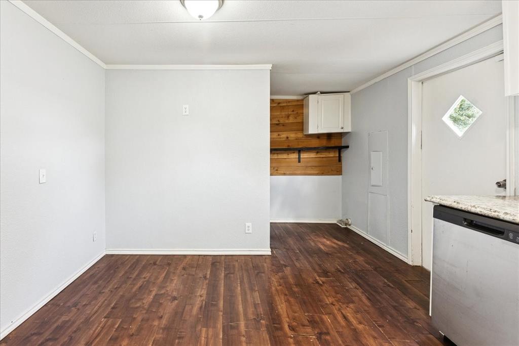 107 Hidden View Court Springtown, TX 76082 - Photo 20 of 24 a view of empty room with wooden floor and fan