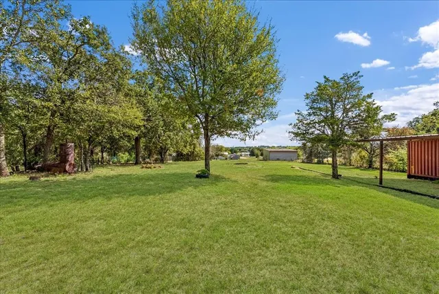 a view of field with trees