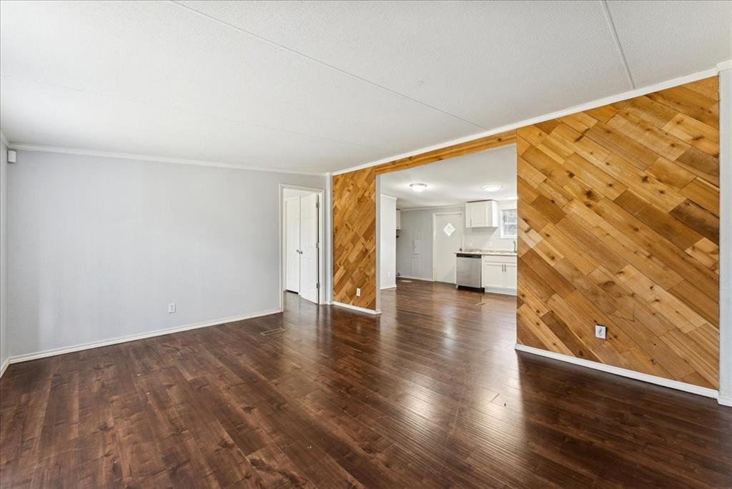 107 Hidden View Court Springtown, TX 76082 - Photo 8 of 24 a view of empty room with wooden floor
