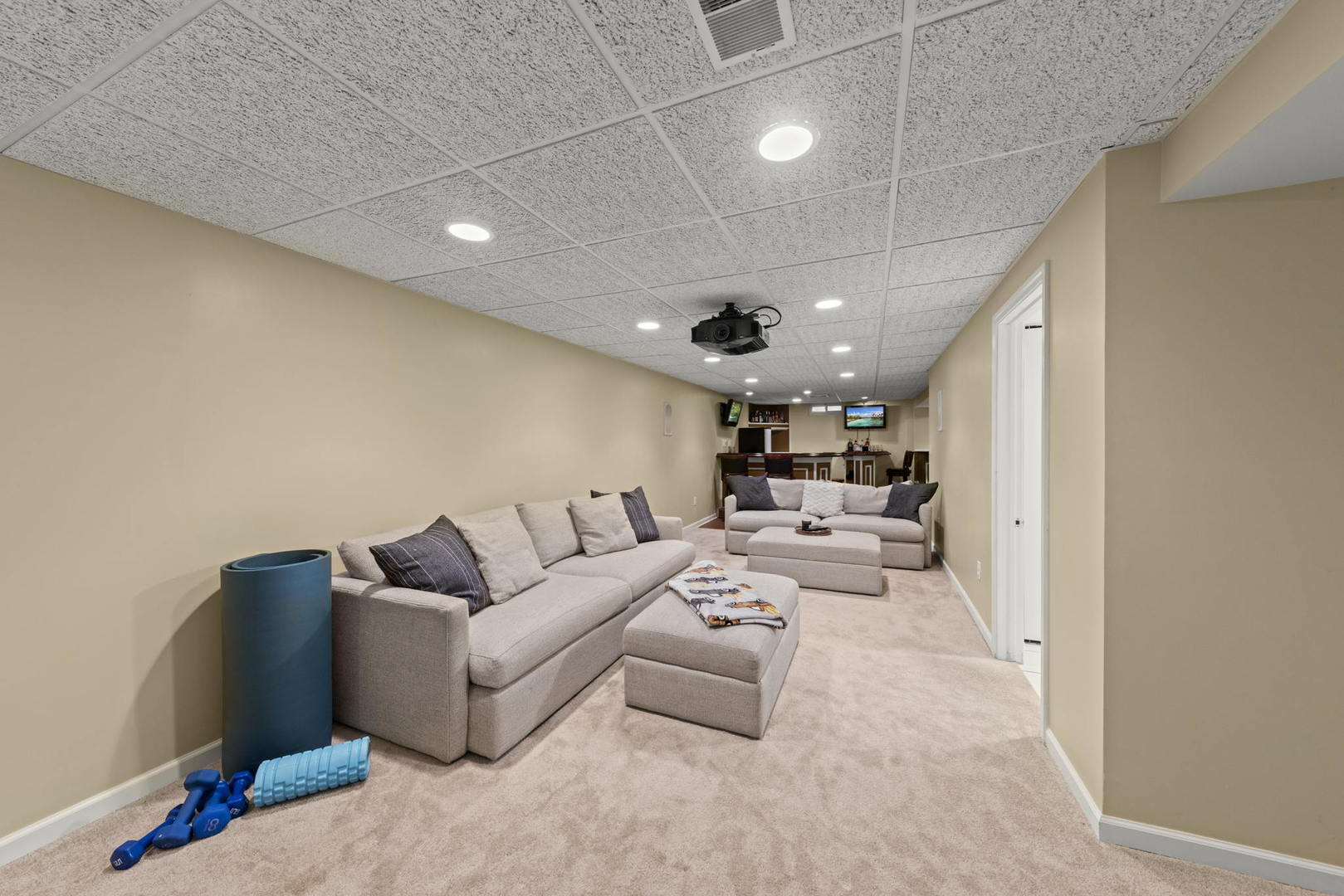 49 Old Post Road Montgomery, IL 60538 - Photo 20 of 31 a living room with furniture and a chandelier