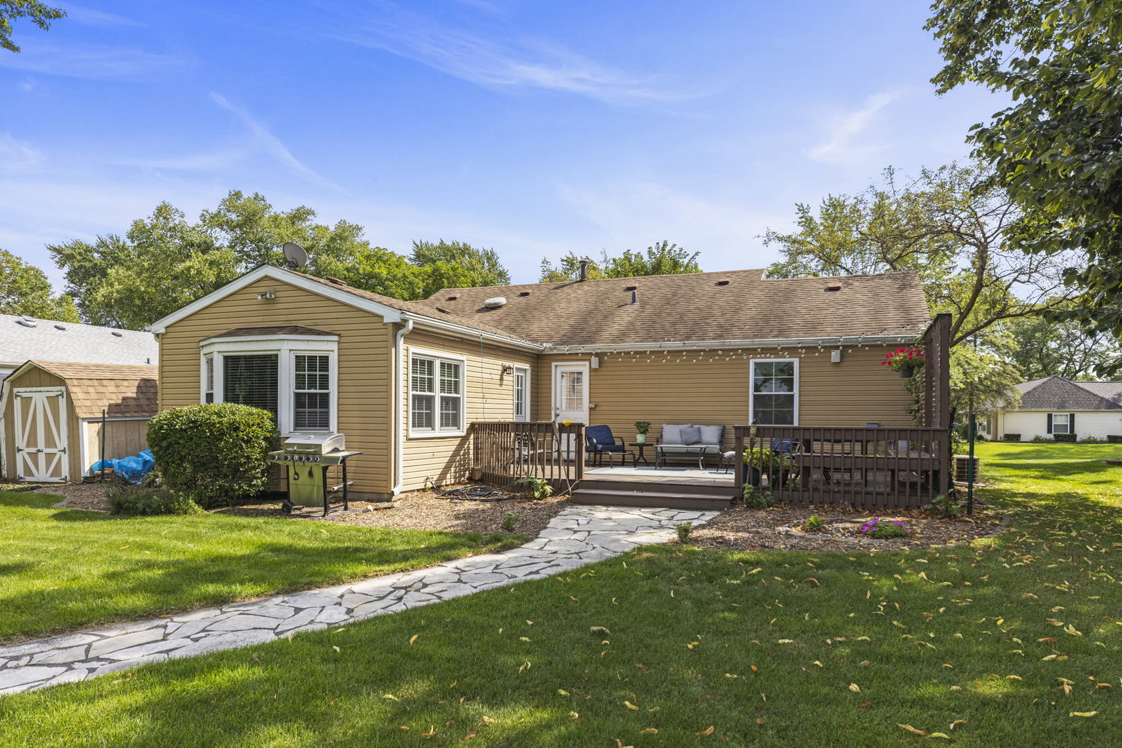 49 Old Post Road Montgomery, IL 60538 - Photo 24 of 31 a front view of a house with a garden and yard