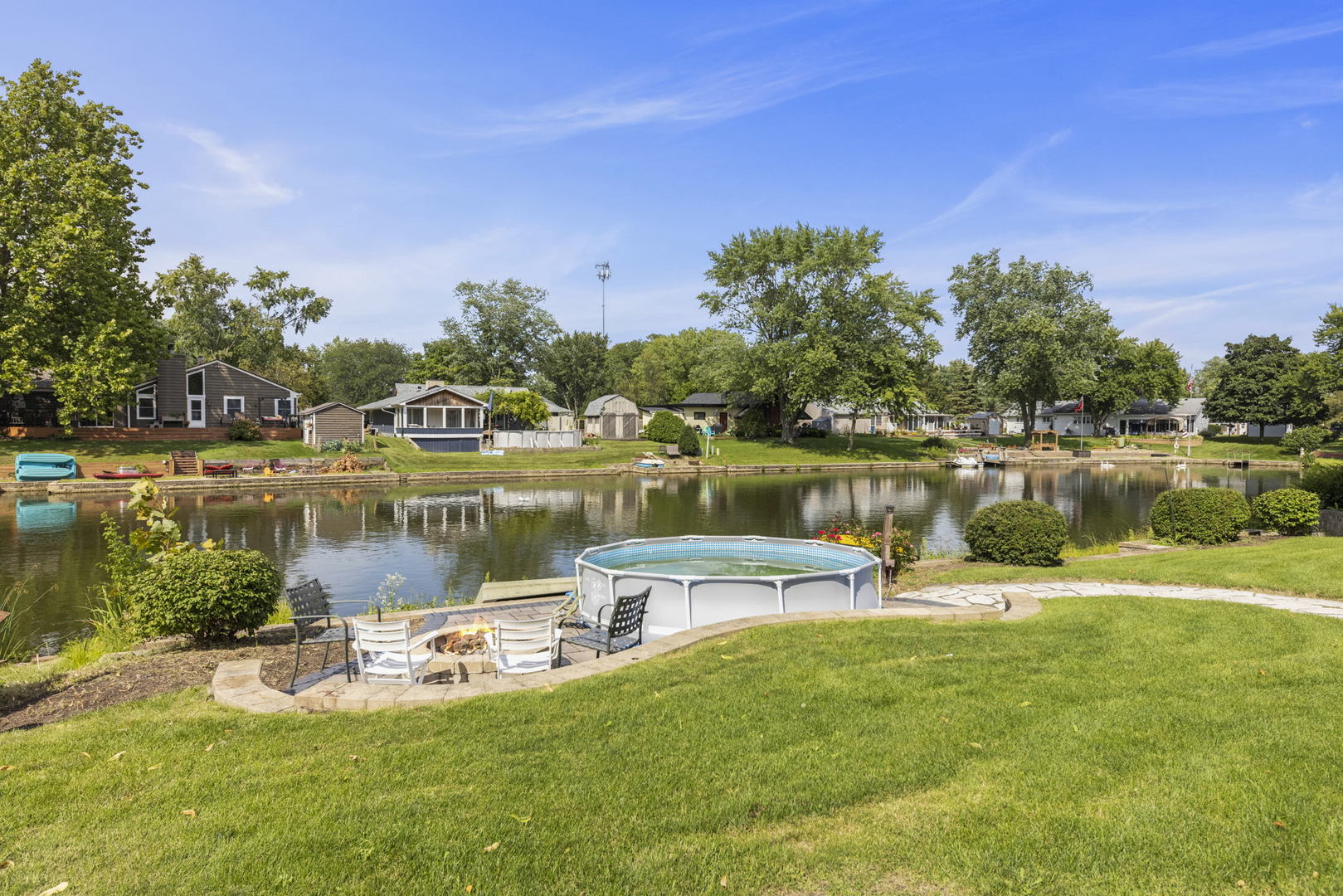 49 Old Post Road Montgomery, IL 60538 - Photo 26 of 31 a view of a lake with houses in the back