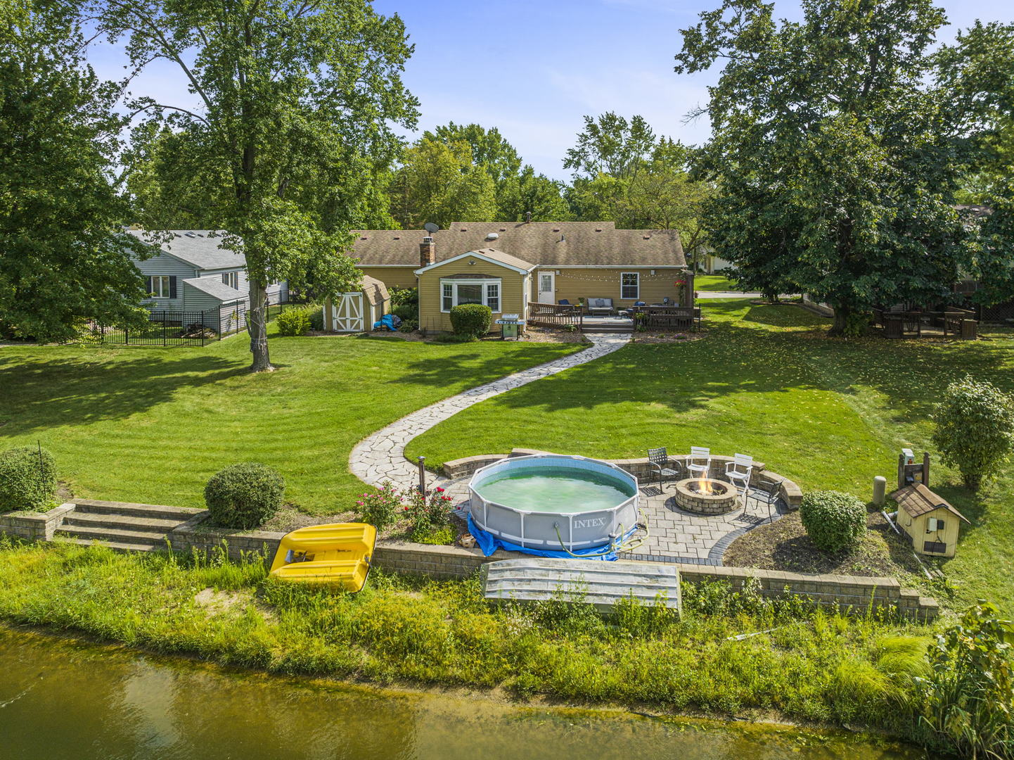 49 Old Post Road Montgomery, IL 60538 - Photo 27 of 31 an aerial view of a house with swimming pool garden and patio