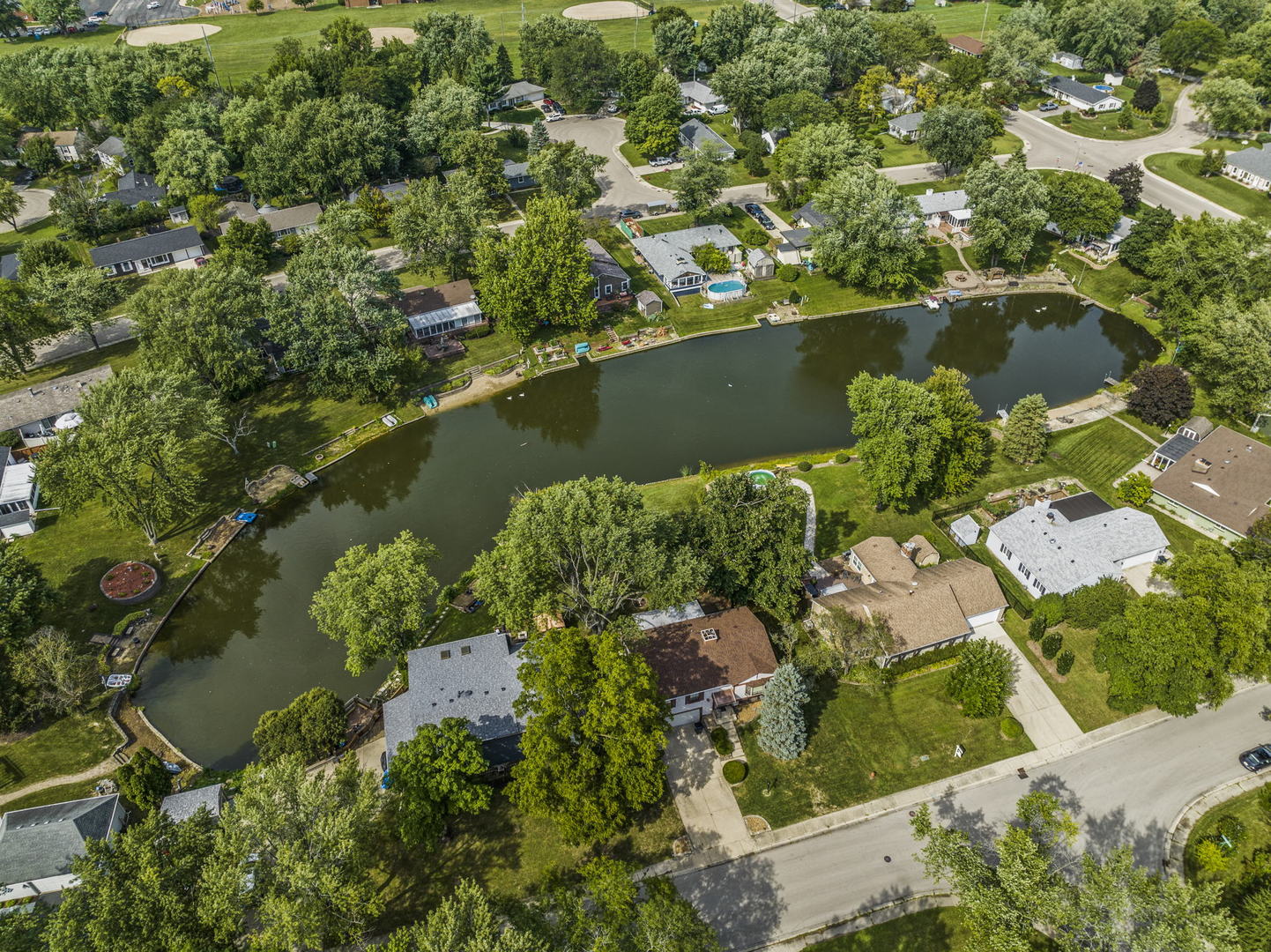 49 Old Post Road Montgomery, IL 60538 - Photo 29 of 31 an aerial view of lake residential house with outdoor space and trees all around