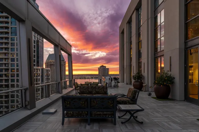 a kitchen with stainless steel appliances a sink stove and cabinets