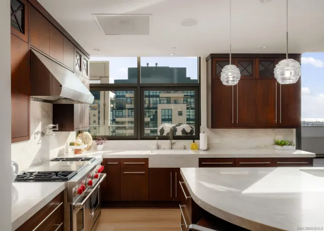 a spacious bathroom with a granite countertop double vanity sink and a mirror