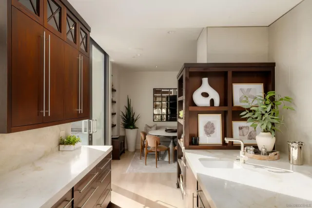 a spacious bathroom with a double vanity sink and a mirror