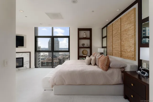 a bathroom with a tub a sink and a shower