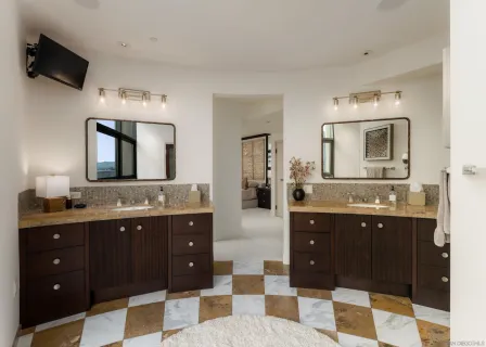 a view of a kitchen with sink washer and dryer