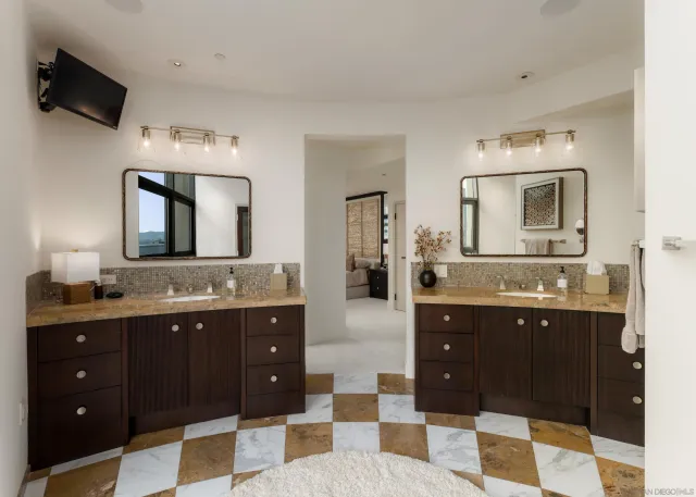 a view of a kitchen with sink washer and dryer