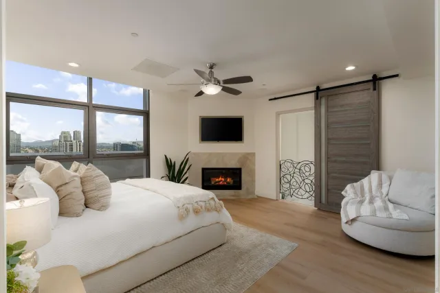 a view of a backyard with sitting area