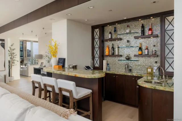 a large kitchen with lots of counter space and windows