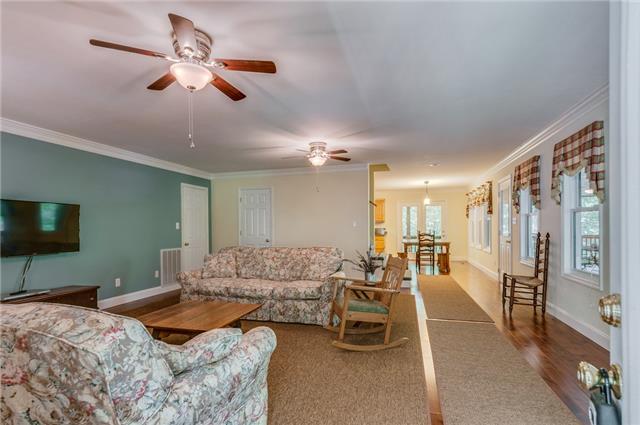 2047 Ridgeview Run Lynchburg, TN 37352 - Photo 2 of 20 Enter this wonderful living room on the main level with new hardwood flooring!!