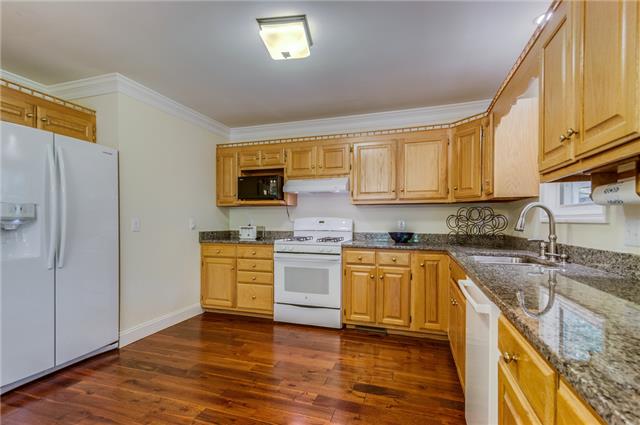 2047 Ridgeview Run Lynchburg, TN 37352 - Photo 4 of 20 The remodeled kitchen has a gas stove, granite countertops and is large enough for an island-if you want one!!