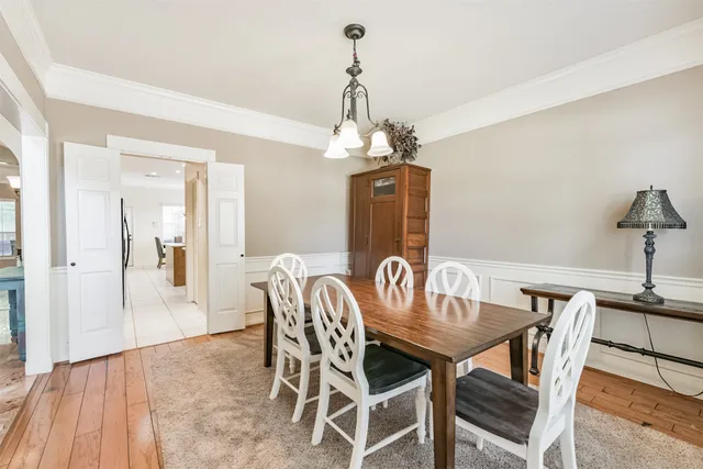 a view of living room with furniture and floor to ceiling windows