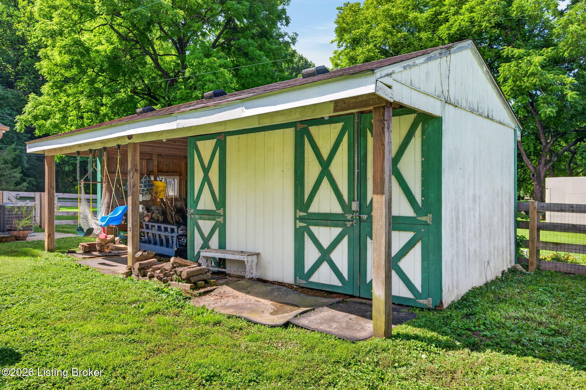 2104 North Rose Island Road Prospect, KY 40059 - Photo 5 of 57 The barn style outhouse features double doors and a covered entry