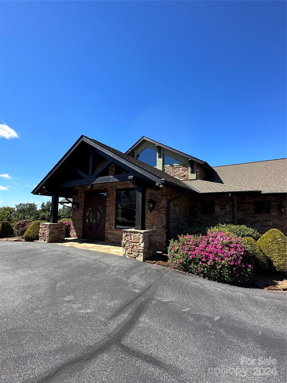 0 Golden Ridge Drive, Unit 134 Lake Lure, NC 28746 - Photo 25 of 30 a front view of a house
