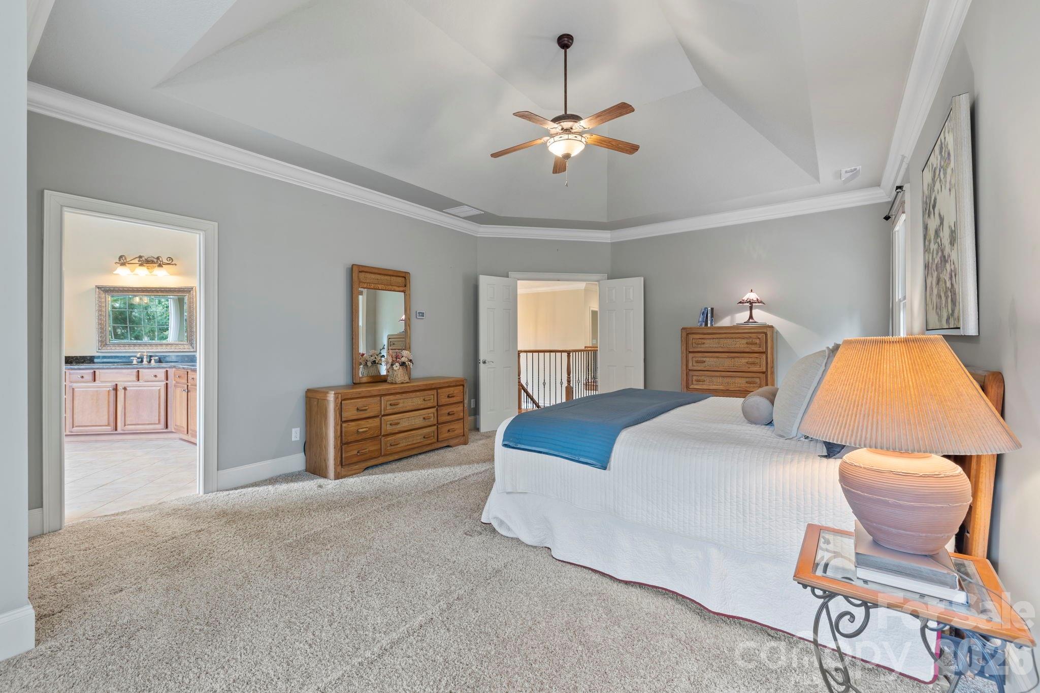 46 Beale Court Fletcher, NC 28732 - Photo 20 of 48 a bedroom with furniture and wooden floor