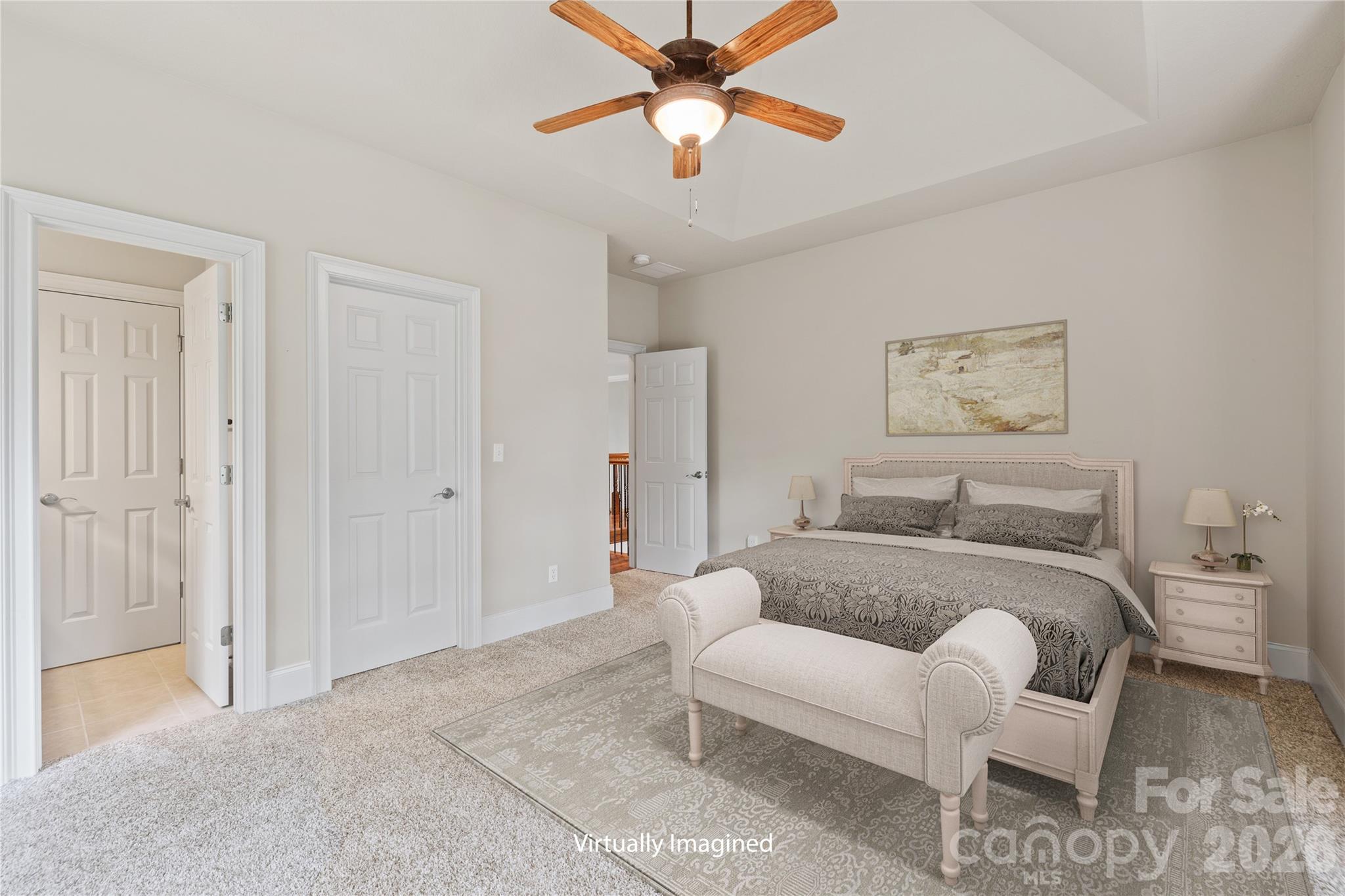 46 Beale Court Fletcher, NC 28732 - Photo 25 of 48 a spacious bedroom with a bed and a chandelier