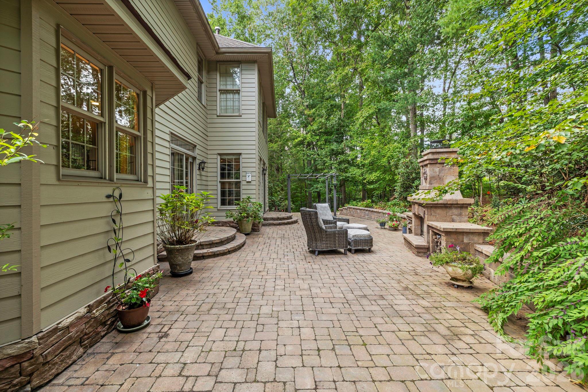 46 Beale Court Fletcher, NC 28732 - Photo 34 of 48 a backyard of a house with seating space