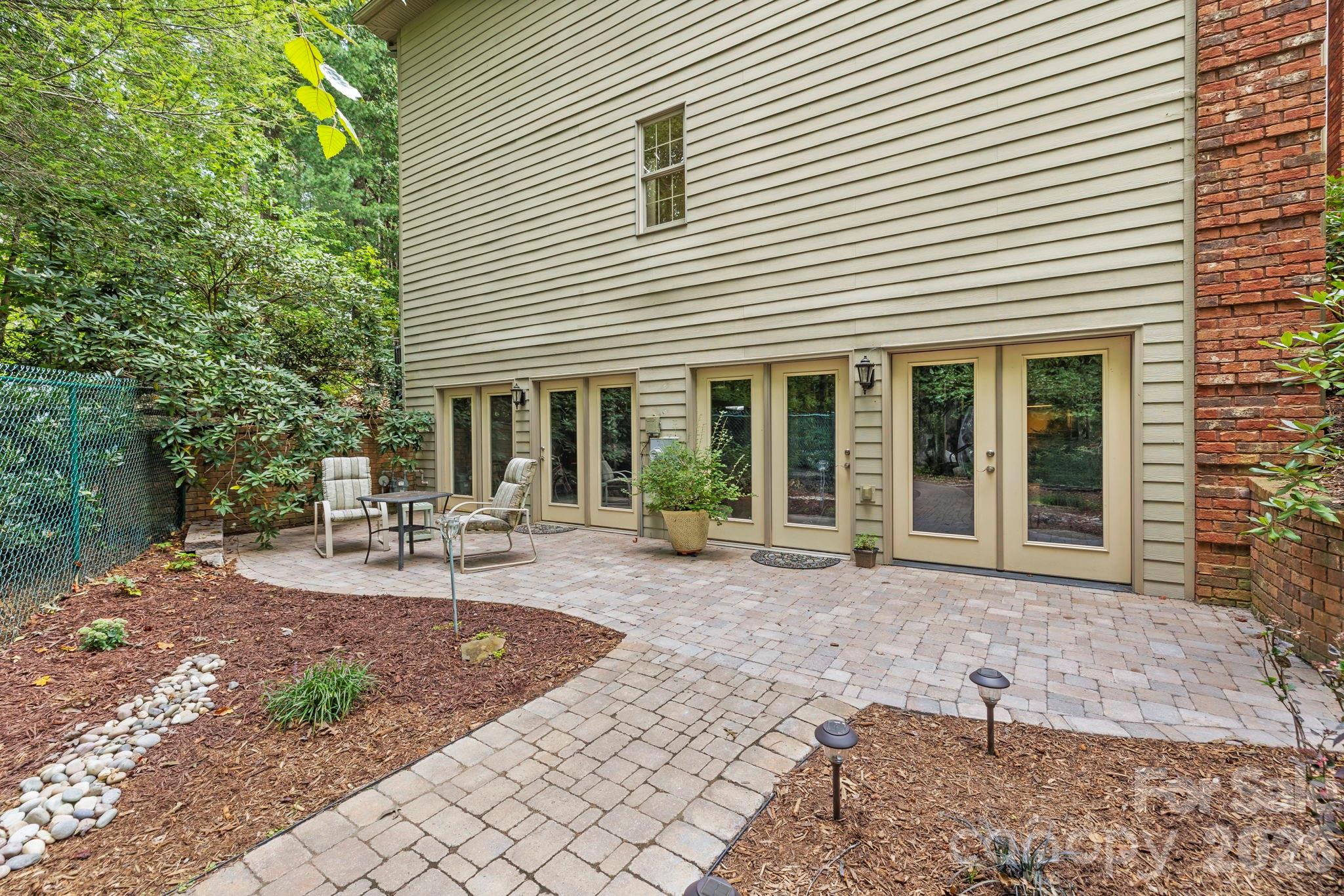 46 Beale Court Fletcher, NC 28732 - Photo 35 of 48 a view of a house with backyard and sitting area